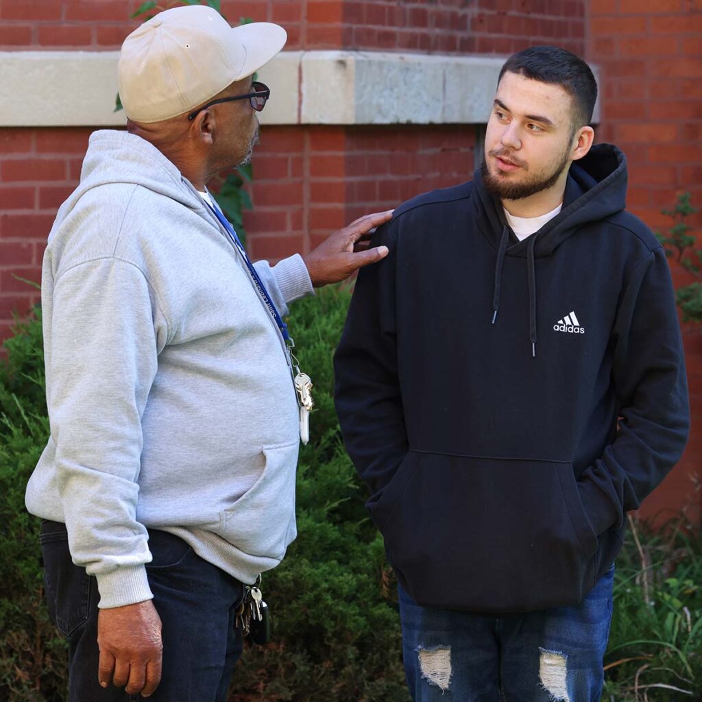 Two Saint Leonard's community members talking